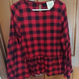 Buffalo plaid ruffle sleeve and bottom top